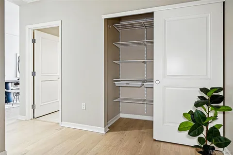 a view of a hallway with washer and dryer