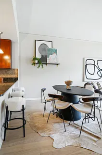 a workspace with furniture and window