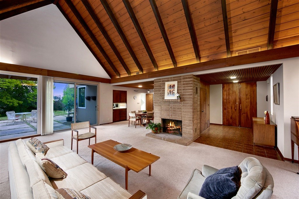 15022 Paso Del Sol Del Mar, CA 92014 - Photo 1 of 25 a living room with furniture and a fireplace