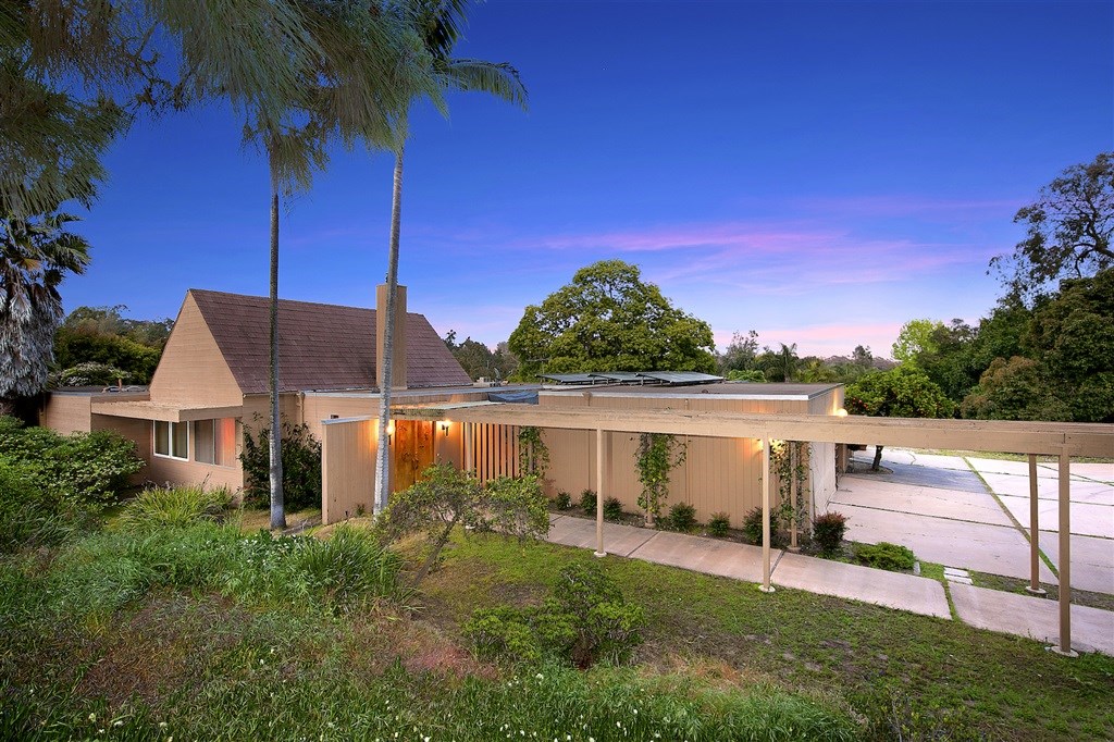 15022 Paso Del Sol Del Mar, CA 92014 - Photo 2 of 25 a front view of a house with a garden