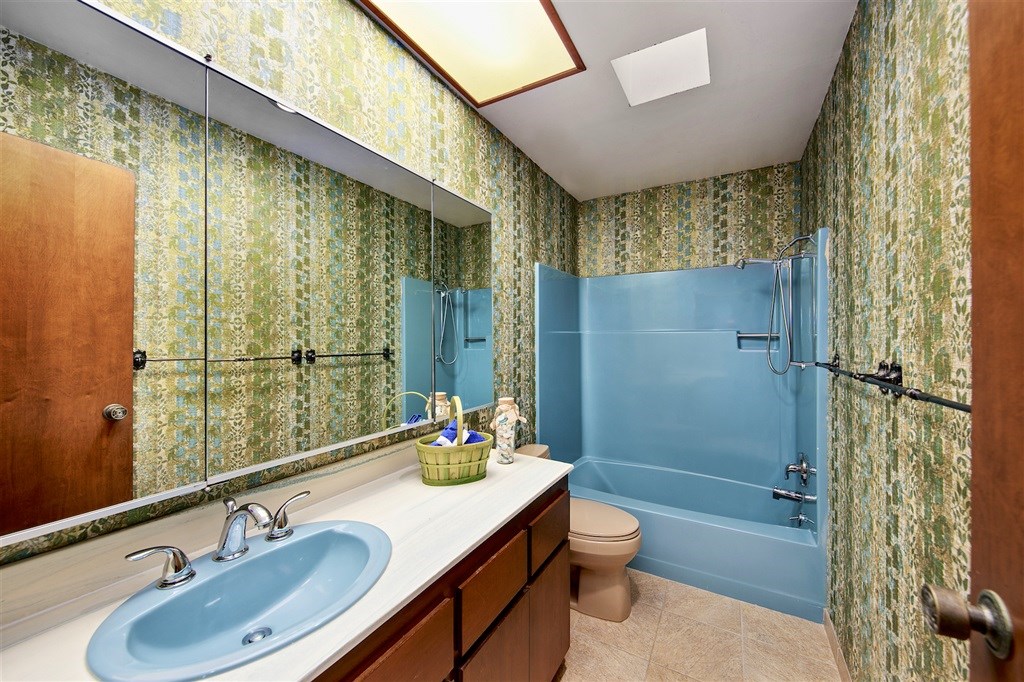 15022 Paso Del Sol Del Mar, CA 92014 - Photo 14 of 25 a bathroom with a sink a toilet and shower