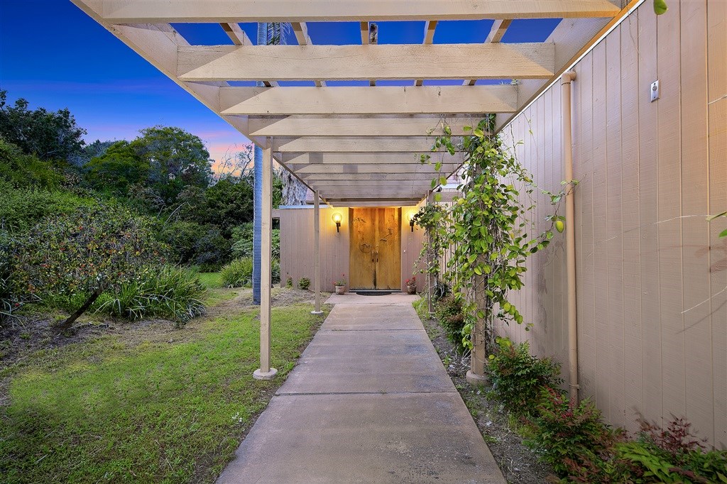 15022 Paso Del Sol Del Mar, CA 92014 - Photo 3 of 25 a view of a house with a yard and pathway