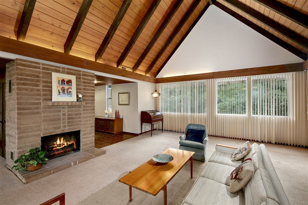 15022 Paso Del Sol Del Mar, CA 92014 - Photo 5 of 25 a living room with furniture and a fireplace