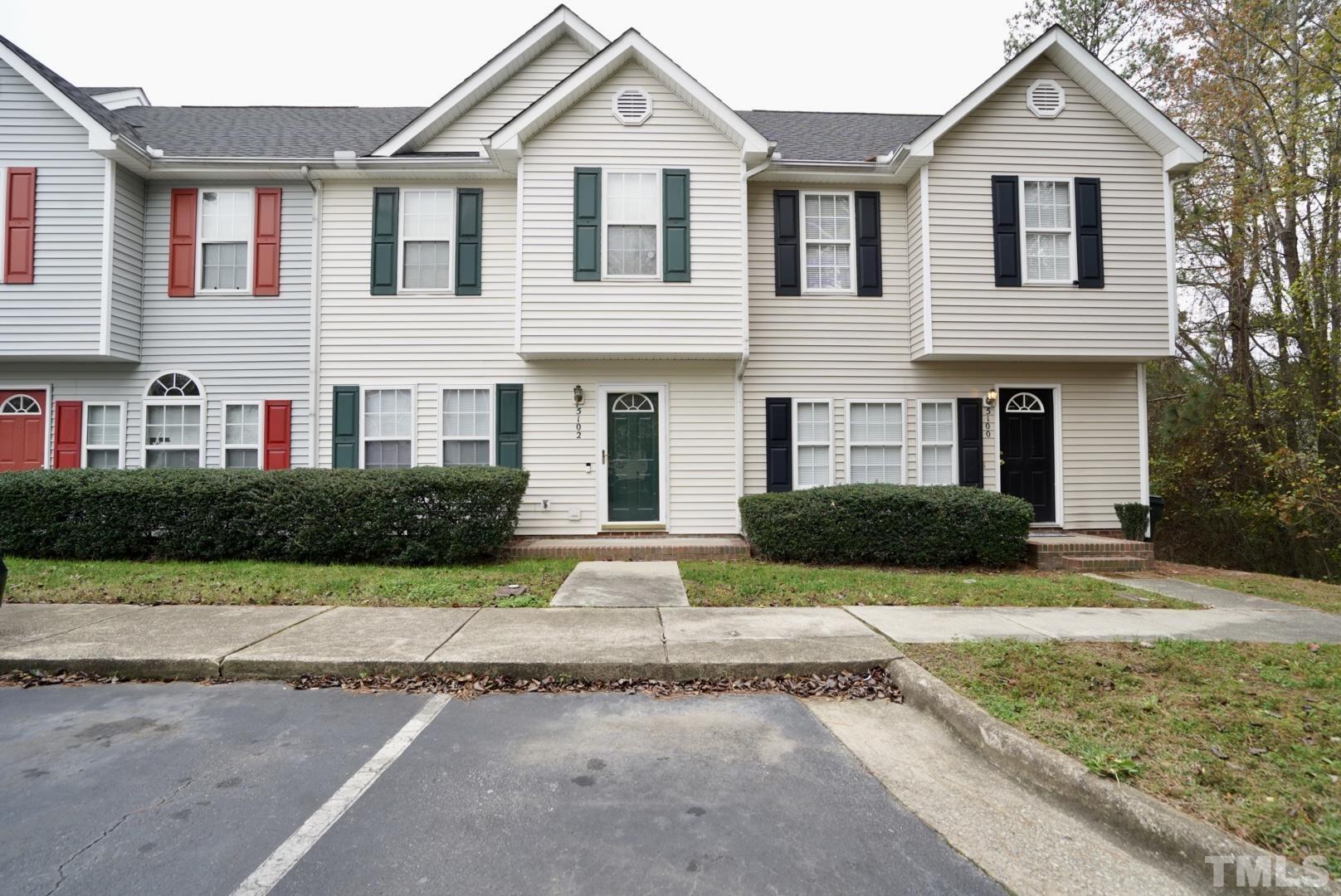 5102 Twisted Willow Way Raleigh, NC 27610 - Photo 1 of 12 a front view of a house with garden