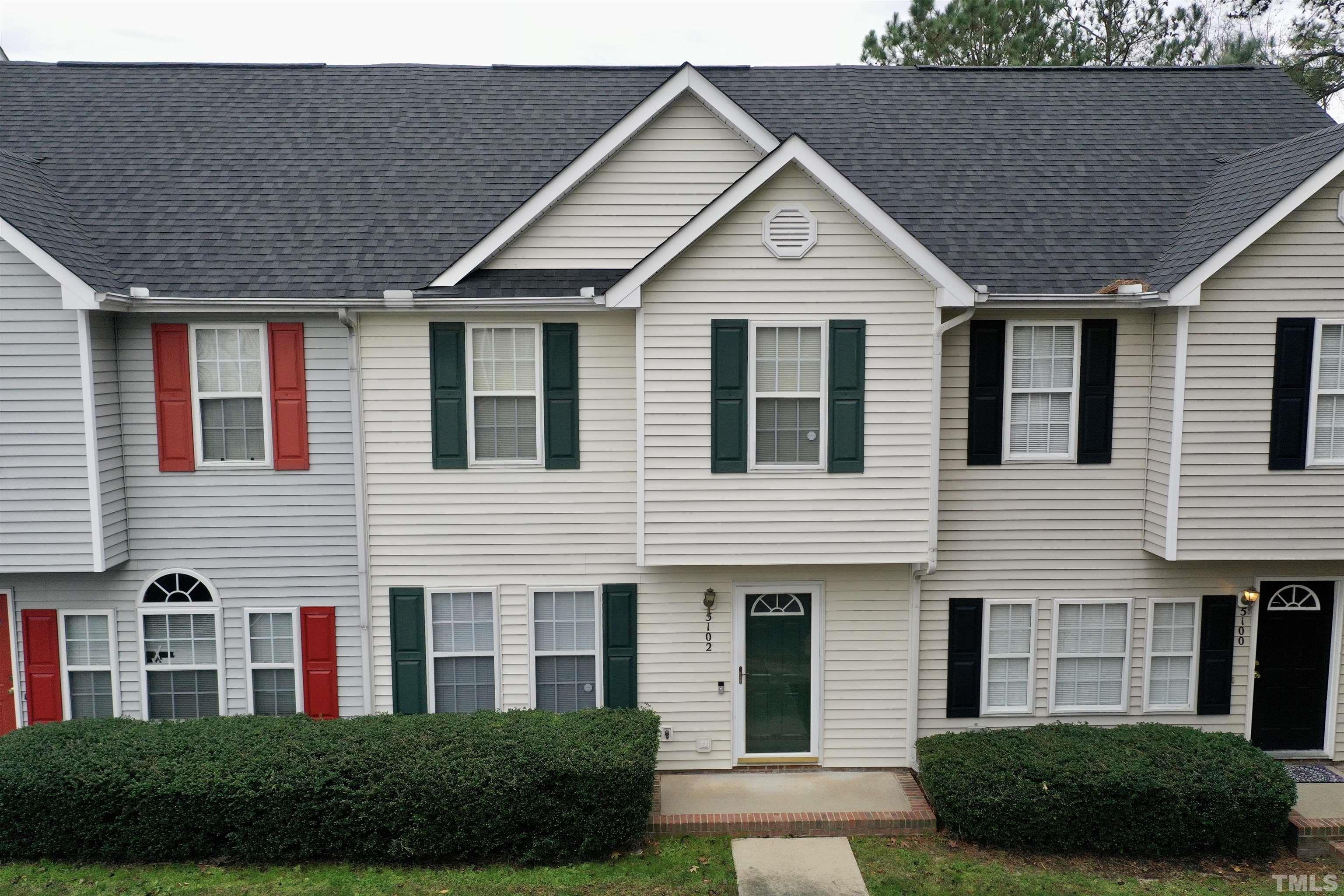 5102 Twisted Willow Way Raleigh, NC 27610 - Photo 12 of 12 a front view of a house with a garden