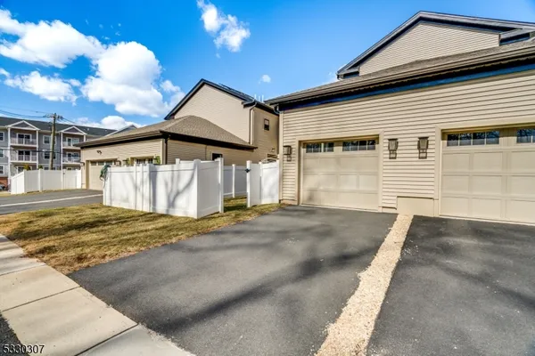 a view of a house with a street