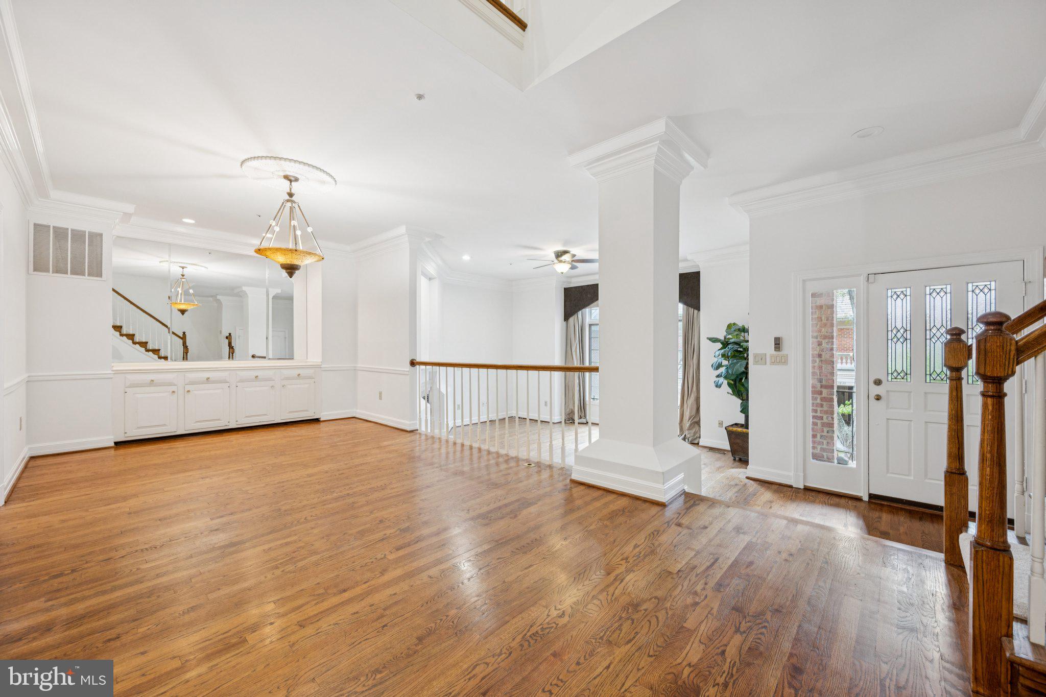 5819 Madaket Road Bethesda, MD 20816 - Photo 14 of 50 a view of a kitchen with wooden floor and a fireplace