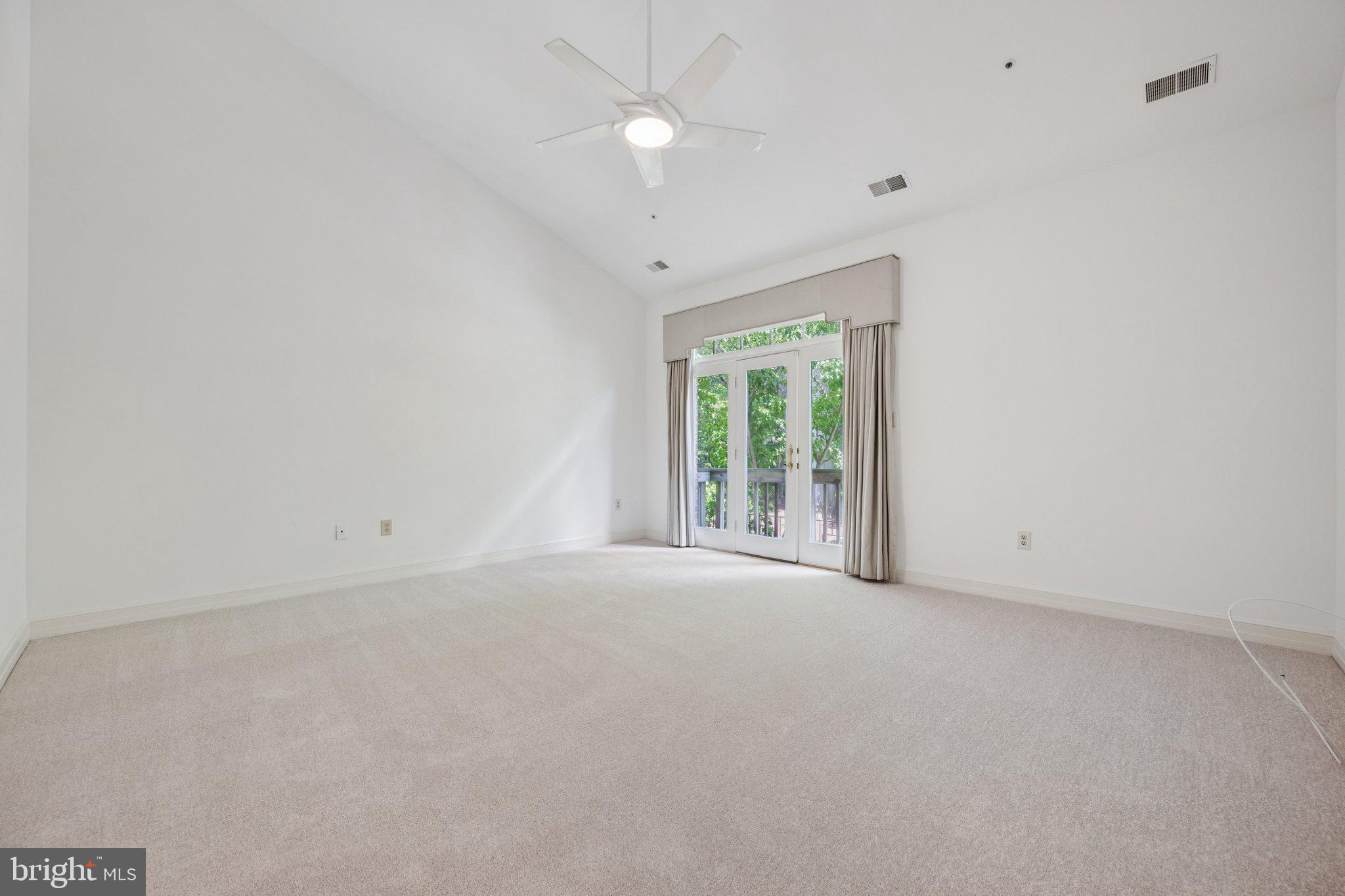5819 Madaket Road Bethesda, MD 20816 - Photo 20 of 50 a view of an empty room with a window