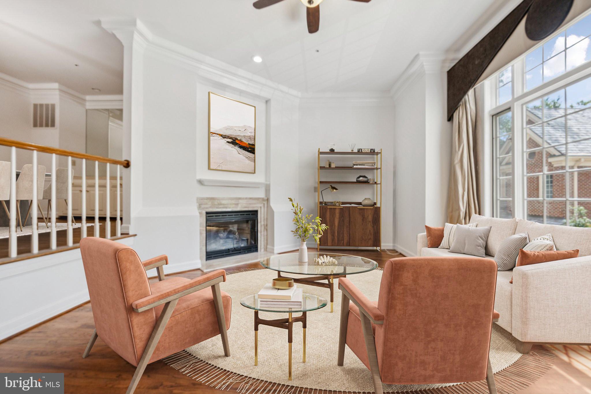 5819 Madaket Road Bethesda, MD 20816 - Photo 2 of 50 a living room with fireplace furniture and a large window