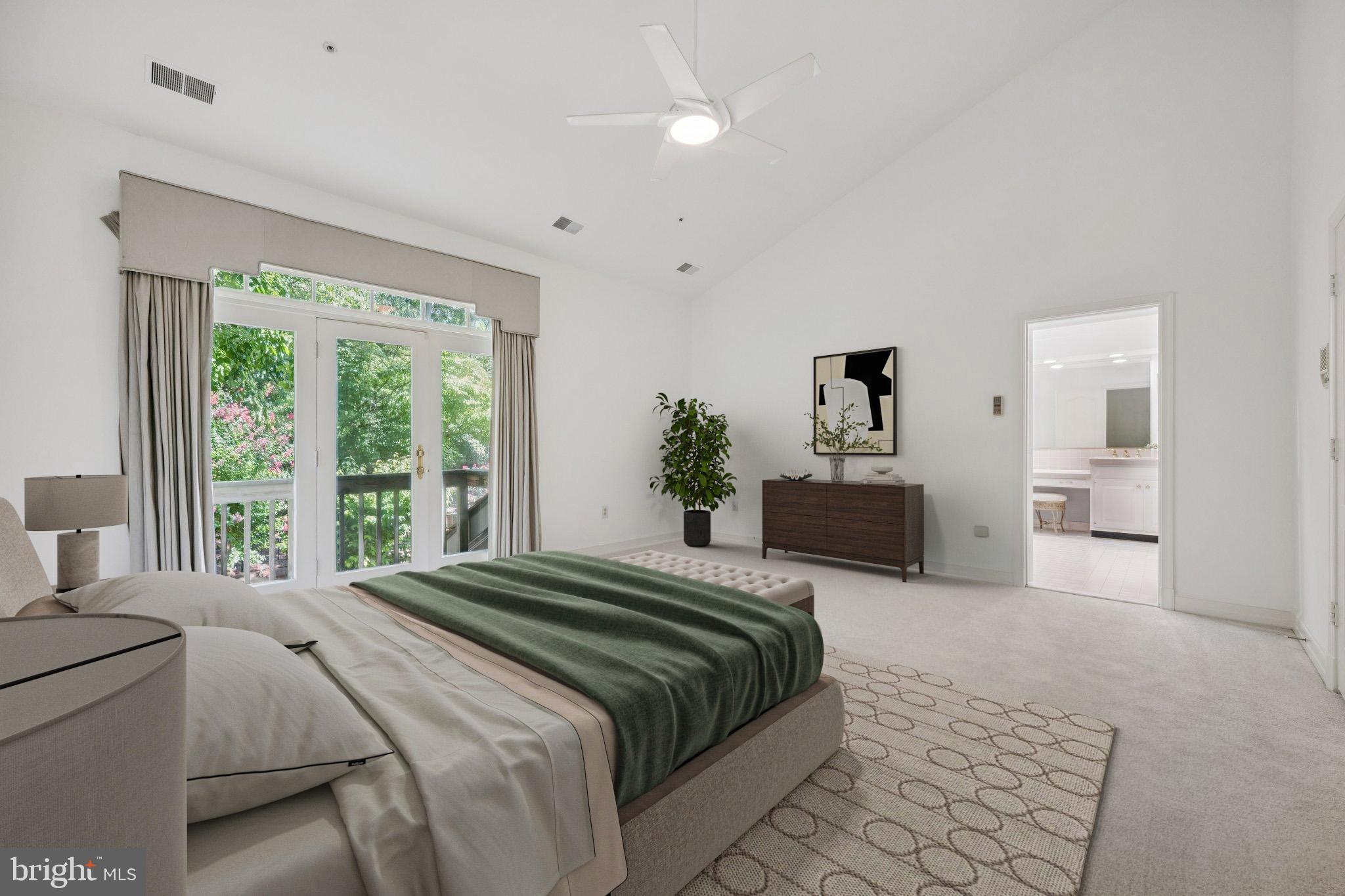 5819 Madaket Road Bethesda, MD 20816 - Photo 21 of 50 a bedroom with a large bed and a dresser