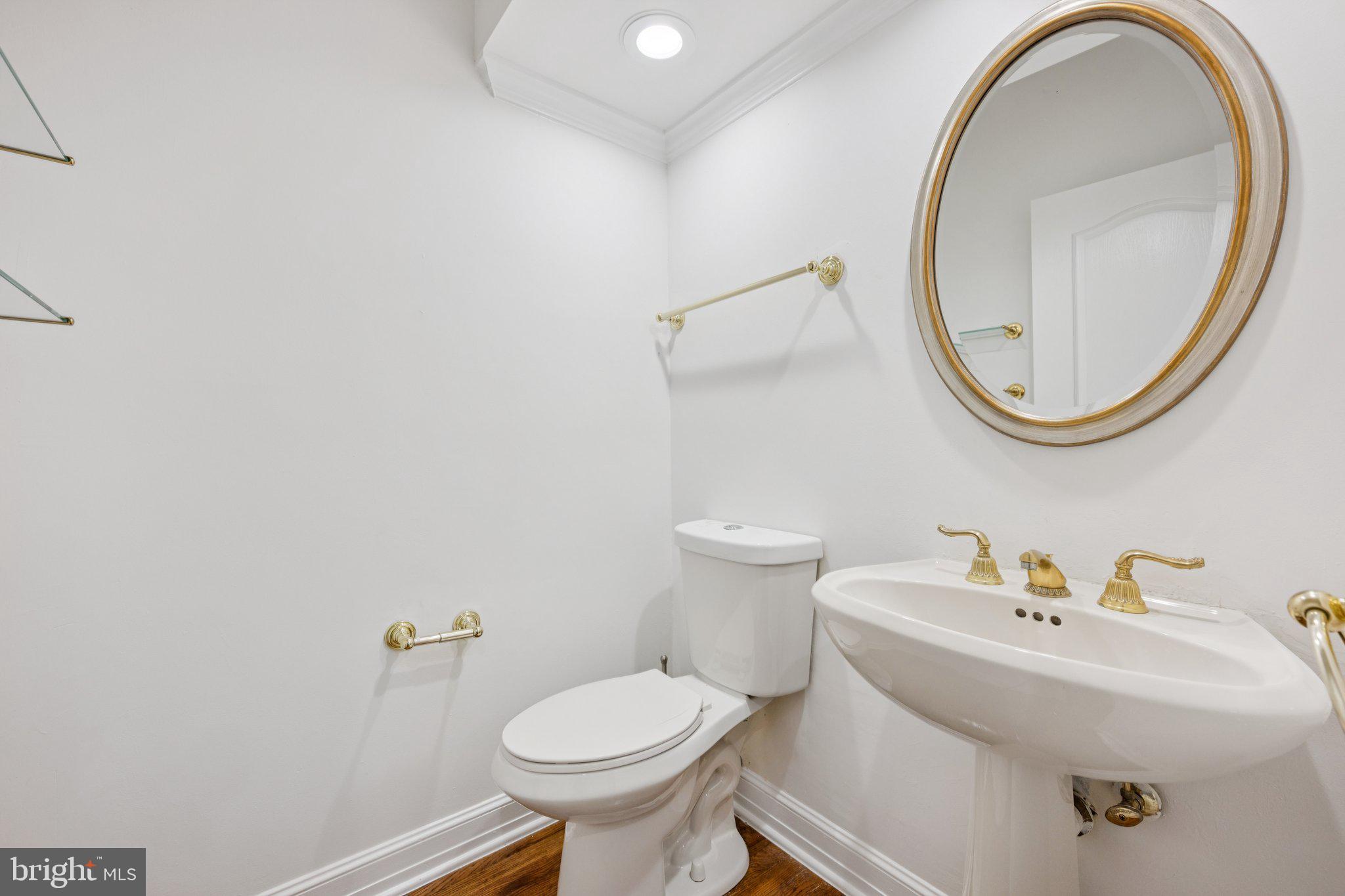 5819 Madaket Road Bethesda, MD 20816 - Photo 32 of 50 a bathroom with a sink and a mirror