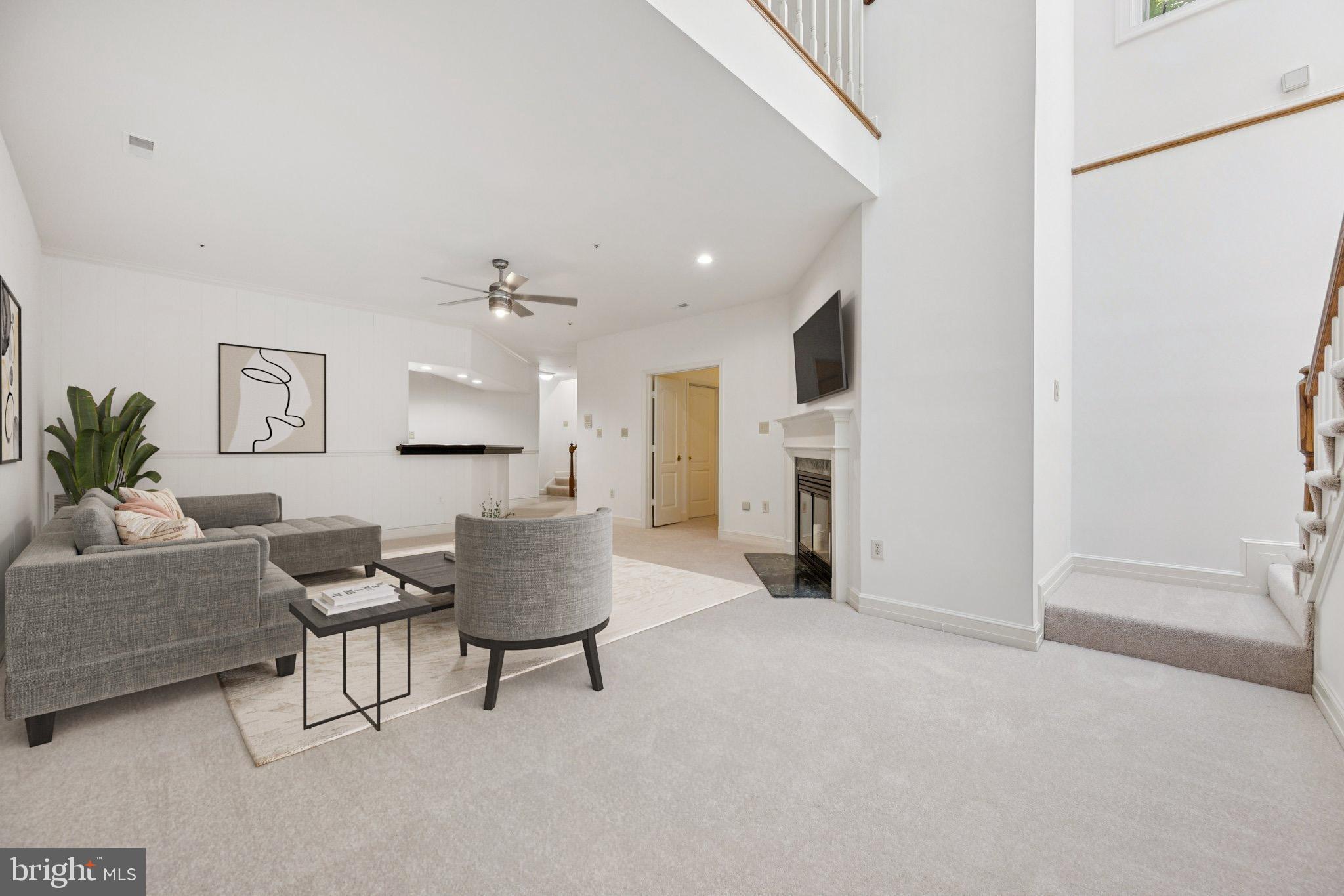 5819 Madaket Road Bethesda, MD 20816 - Photo 35 of 50 a living room with furniture and a potted plant