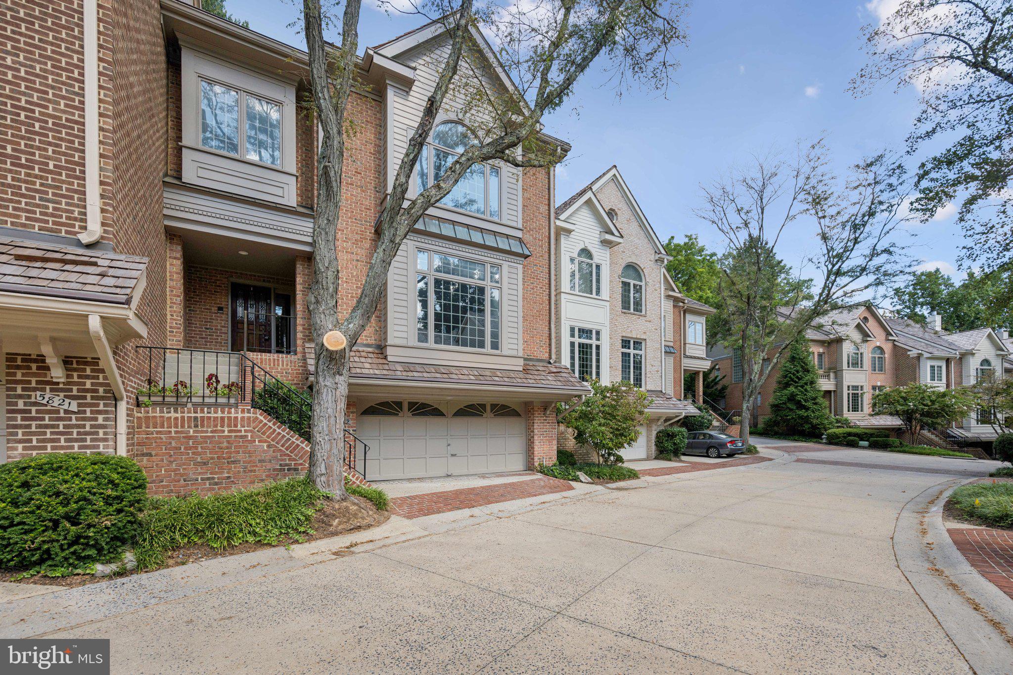 5819 Madaket Road Bethesda, MD 20816 - Photo 46 of 50 a front view of a house with garden