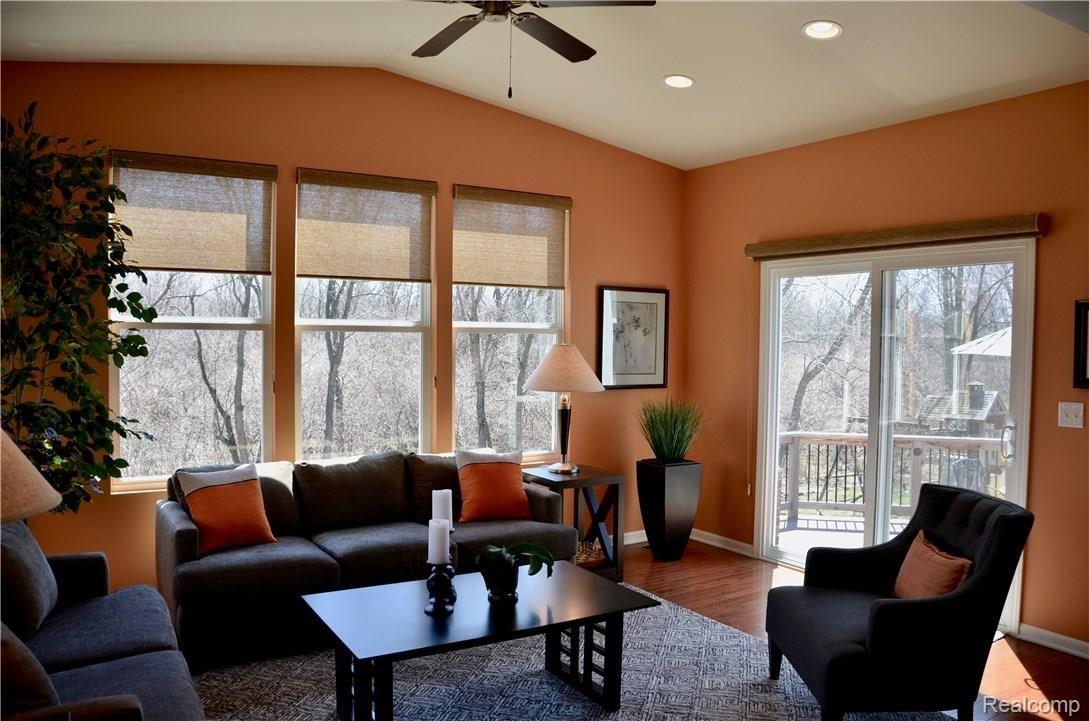 7026 Oakhurst Ridge Road Clarkston, MI 48348 - Photo 11 of 30 More family room with doorwall tonew composite deck