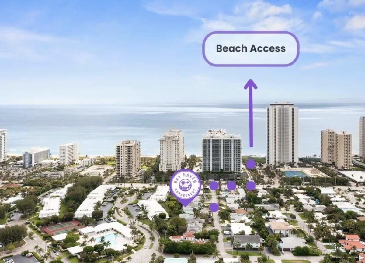 1216 Surf Road Singer Island, FL 33404 - Photo 15 of 15 a view of a city with sign board