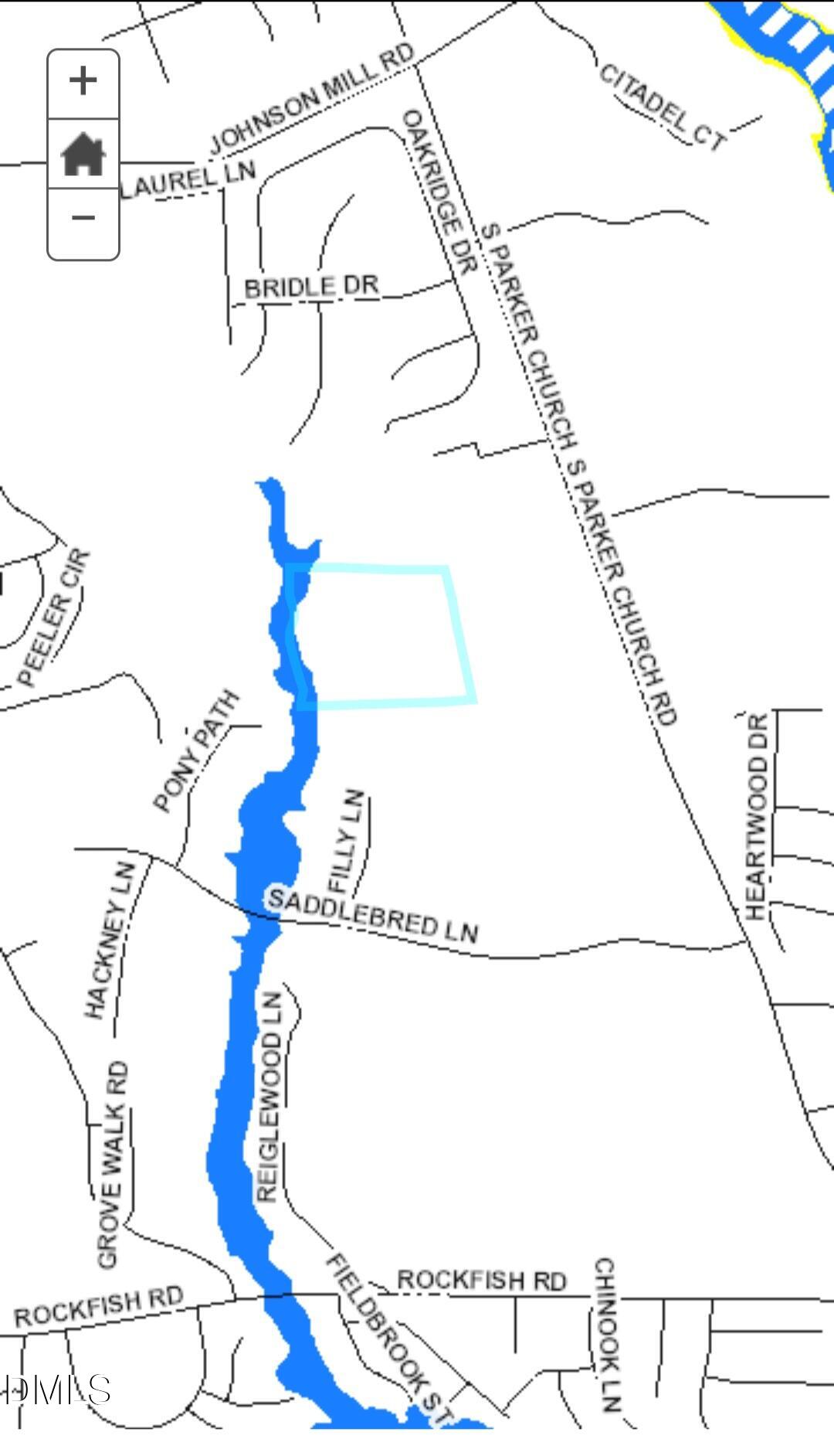 3.6 South Parker Church Road Raeford, NC 28376 - Photo 15 of 23 a picture of a room with a white wall and a potted plant