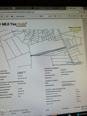 a view of a tennis court with a basket ball court