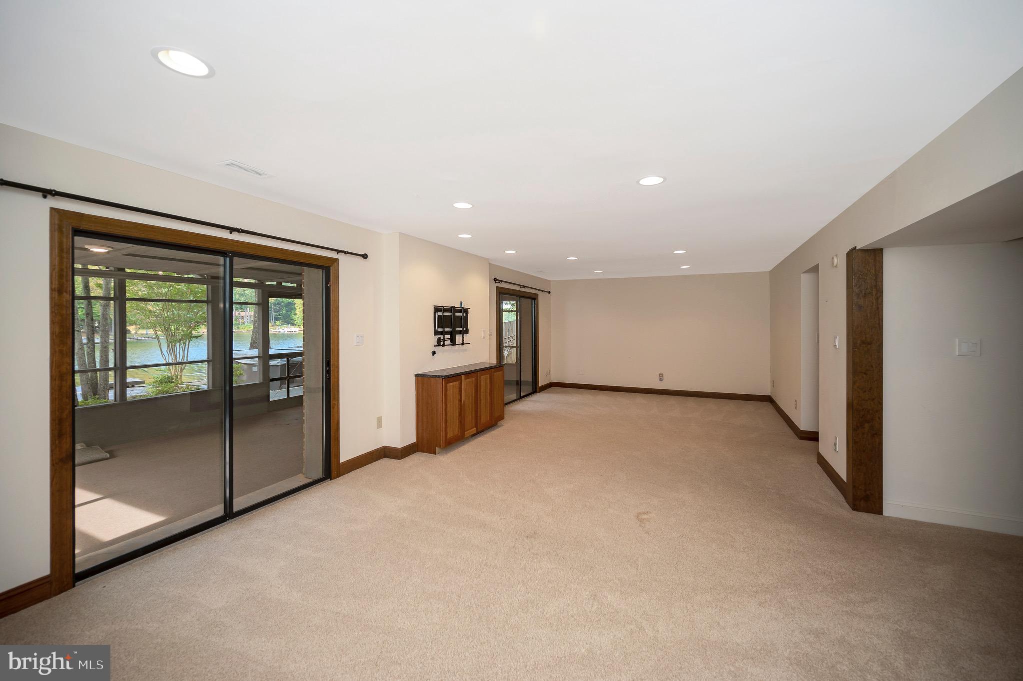 205 Skyline Road Locust Grove, VA 22508 - Photo 38 of 66 Family rooms opens to second screened porch