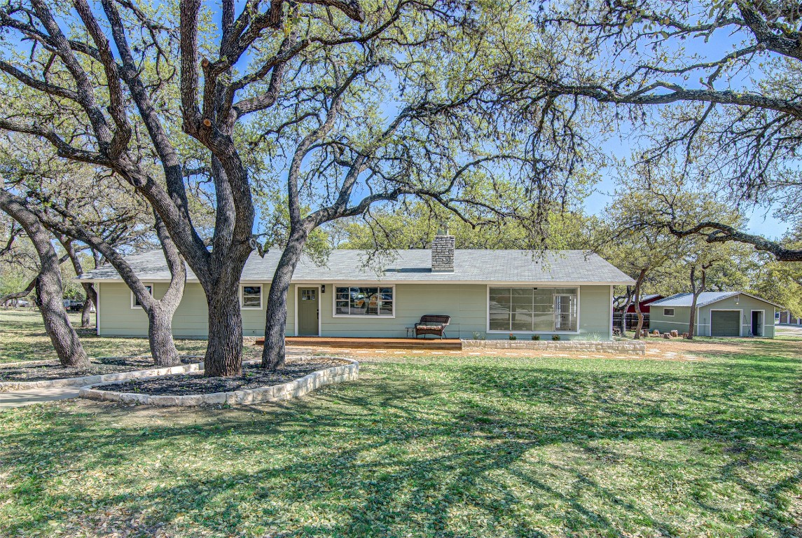a house with trees in the background