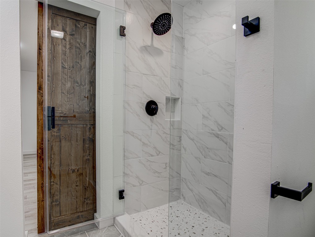 207 Haley Road Johnson City, TX 78636 - Photo 11 of 26 a bathroom with a shower