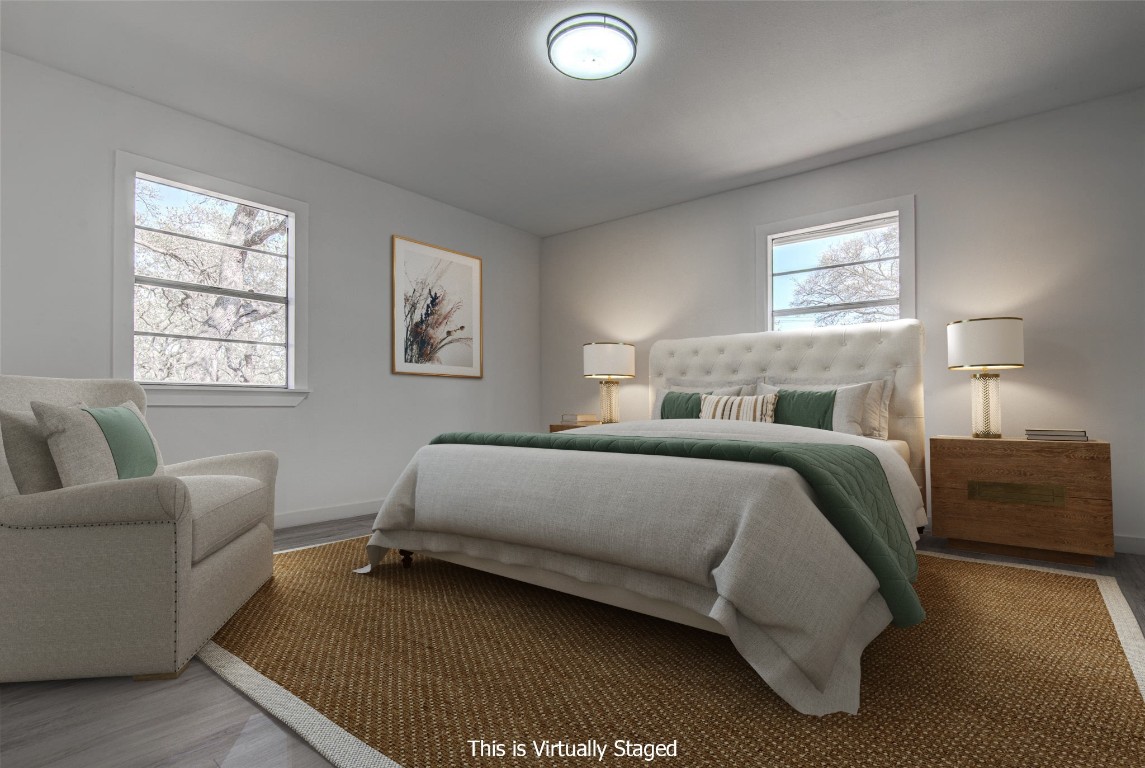 207 Haley Road Johnson City, TX 78636 - Photo 8 of 26 a bedroom with a bed and a couch