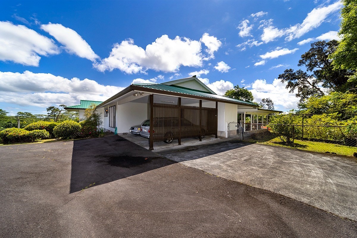 111 Hoaka Road Hilo, HI 96720 - Photo 7 of 21 a view of a house with backyard and sitting area