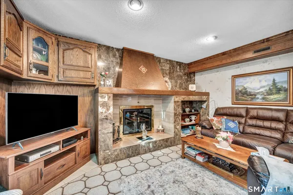 a kitchen with a refrigerator and window
