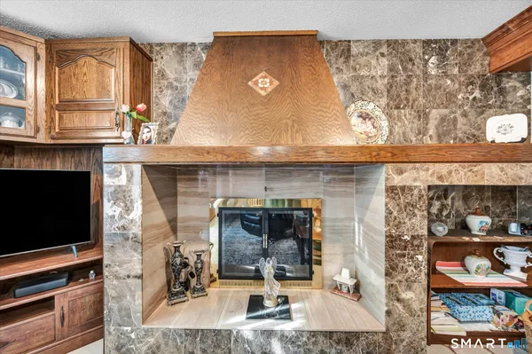 a bed room with a bed and a chandelier