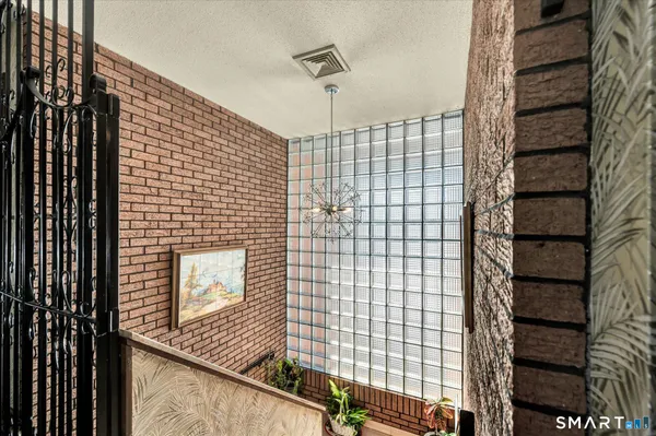 a bathroom with a shower and a toilet