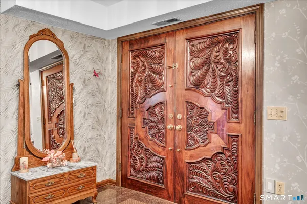 a front view of a house with parking