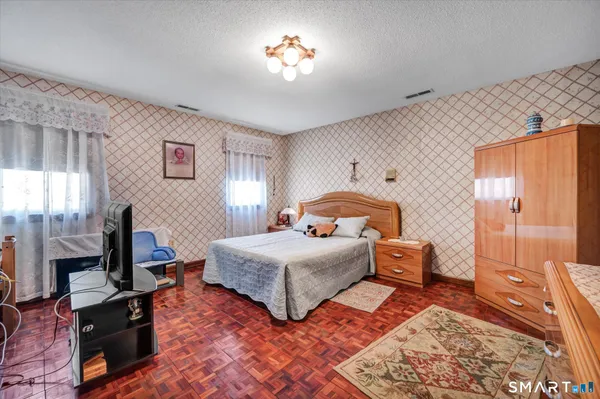 a view of a living room and a large window