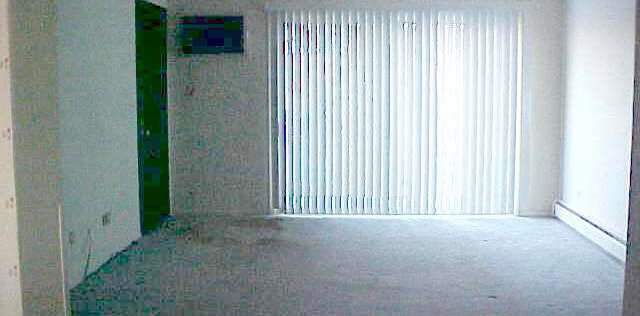 99 East Dundee Road Wheeling, IL 60090 - Photo 3 of 5 an empty room with windows