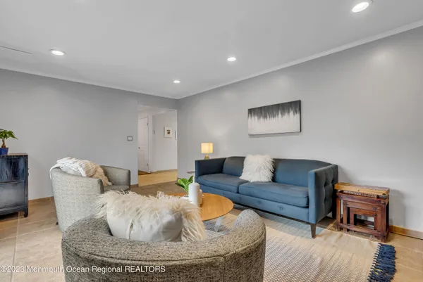 a living room with furniture and a couch