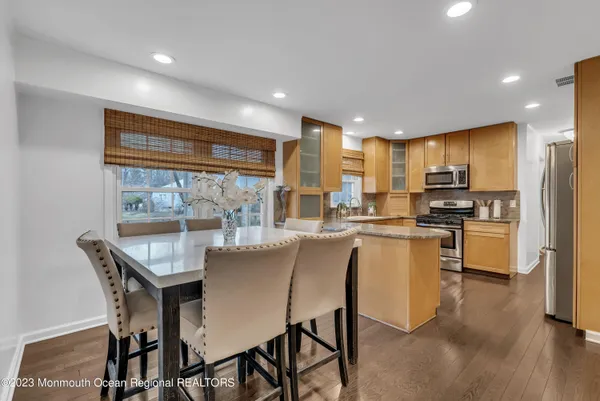 a kitchen with counter top space and appliances