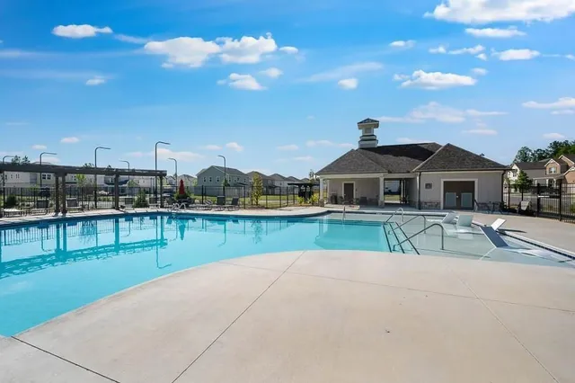 a view of a house with swimming pool