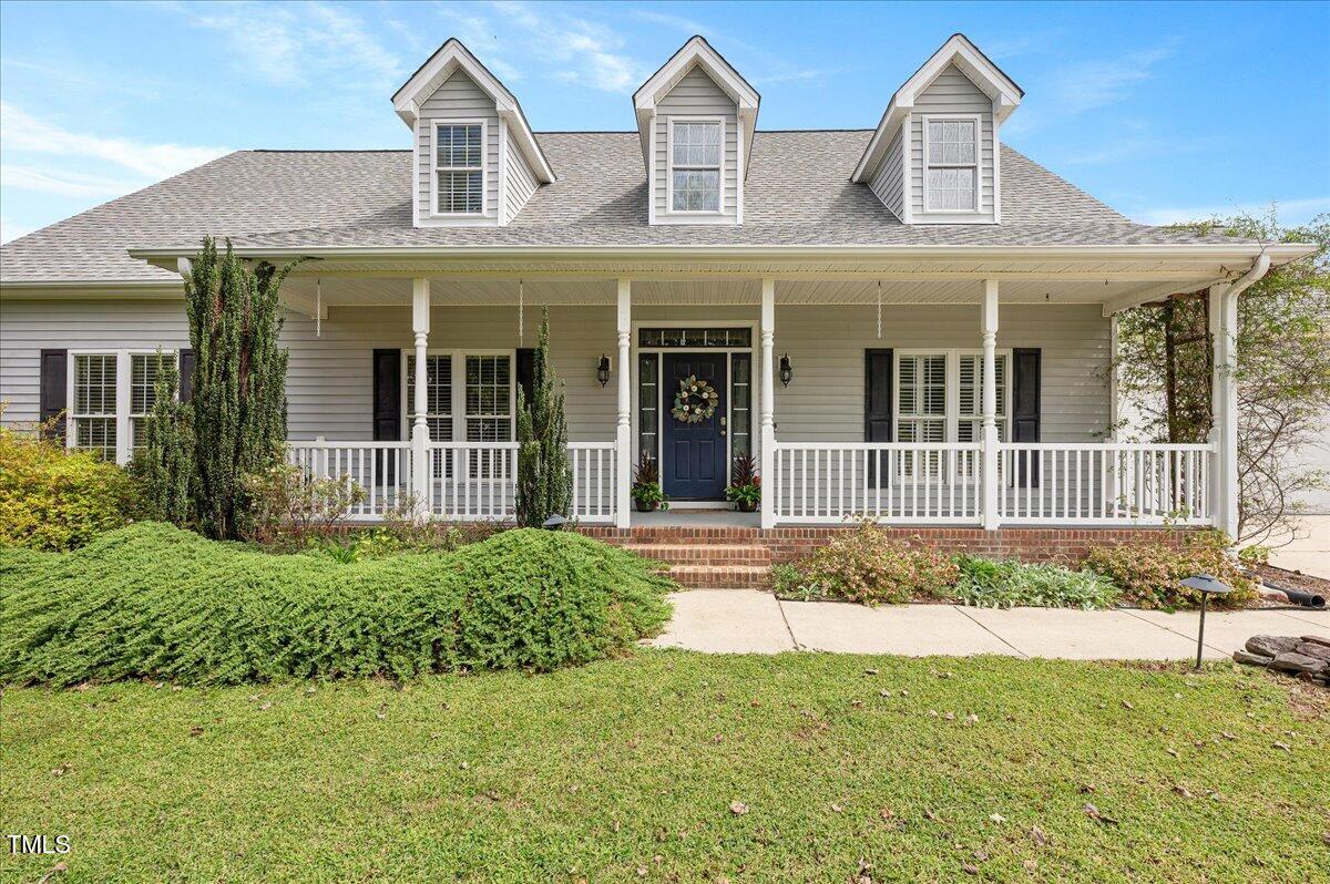 7805 Tuscan Ridge Drive Wendell, NC 27591 - Photo 2 of 40 front view of a house with a yard