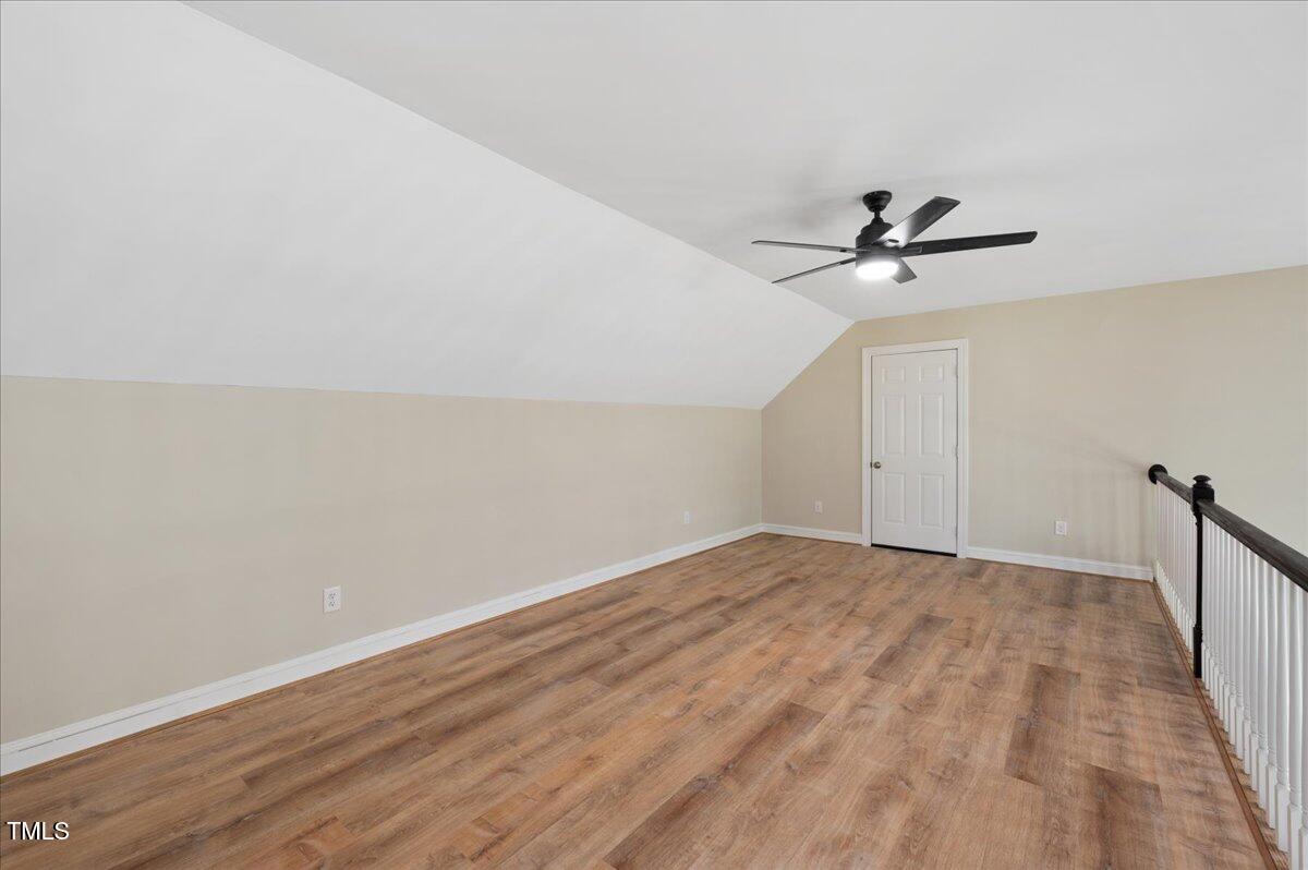 7805 Tuscan Ridge Drive Wendell, NC 27591 - Photo 25 of 40 a view of an empty room with a window
