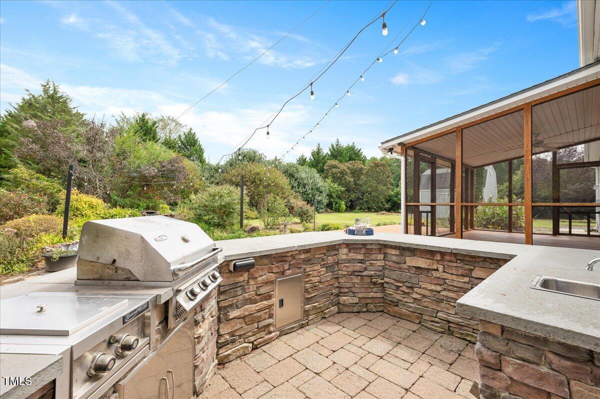 7805 Tuscan Ridge Drive Wendell, NC 27591 - Photo 28 of 40 a view of a house with backyard and sitting area