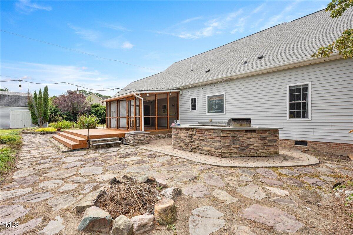 7805 Tuscan Ridge Drive Wendell, NC 27591 - Photo 30 of 40 a view of a house with backyard