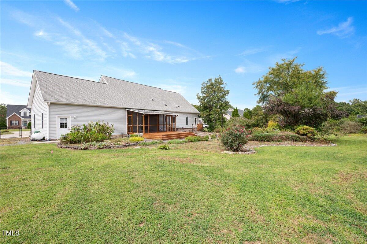 7805 Tuscan Ridge Drive Wendell, NC 27591 - Photo 33 of 40 a front view of a house with a garden