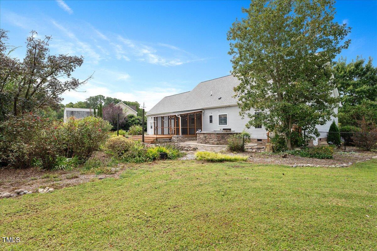 7805 Tuscan Ridge Drive Wendell, NC 27591 - Photo 37 of 40 a front view of a house with a yard