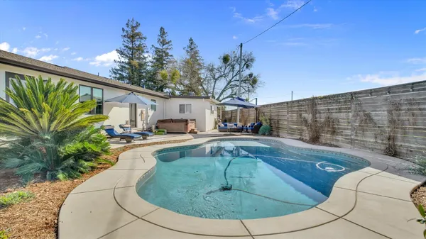 a view of outdoor space yard swimming pool and patio
