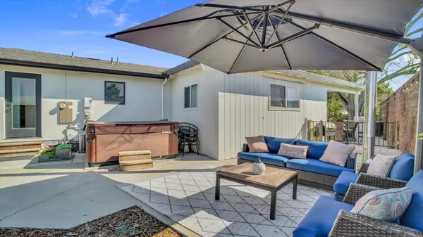 a view of garage with a yard
