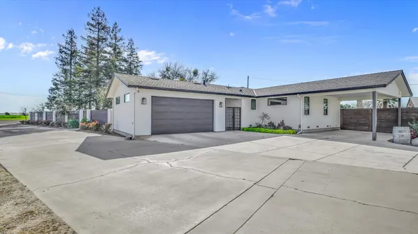 a front view of a house with patio