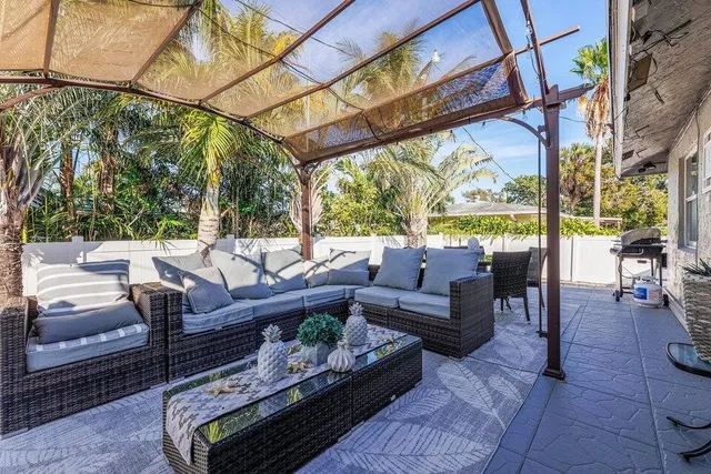 a view of patio with furniture