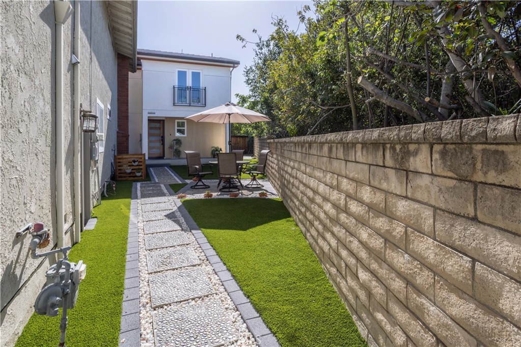 19429 Singing Hills Drive Porter Ranch, CA 91326 - Photo 2 of 26 a view of swimming pool with a patio