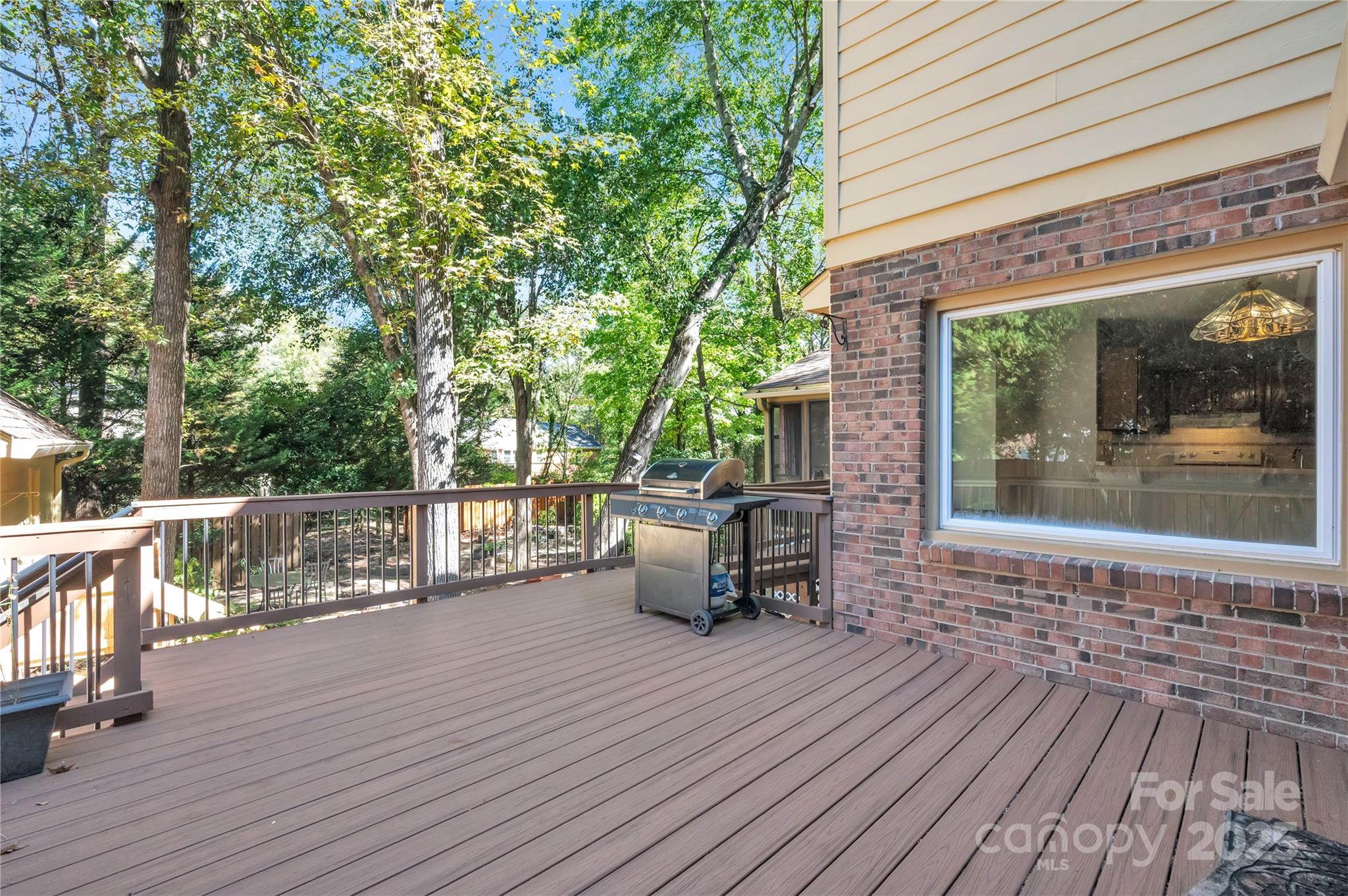 702 Trail Ridge Road Matthews, NC 28105 - Photo 28 of 36 a front view of a house with outdoor seating