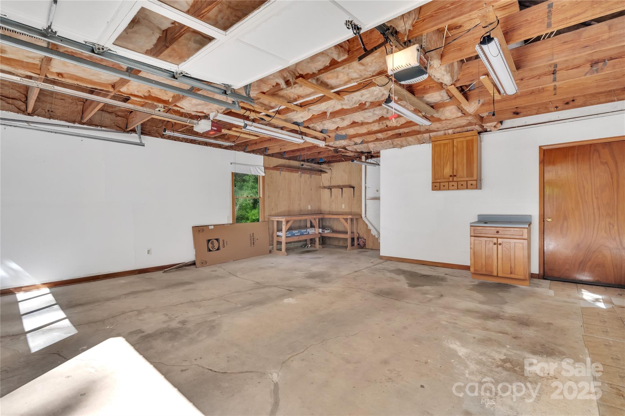 702 Trail Ridge Road Matthews, NC 28105 - Photo 33 of 36 a view of a room with wooden walls