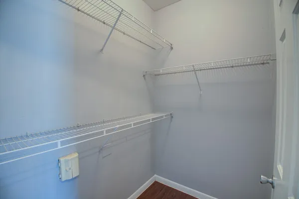 a view of a room with racks on the wall