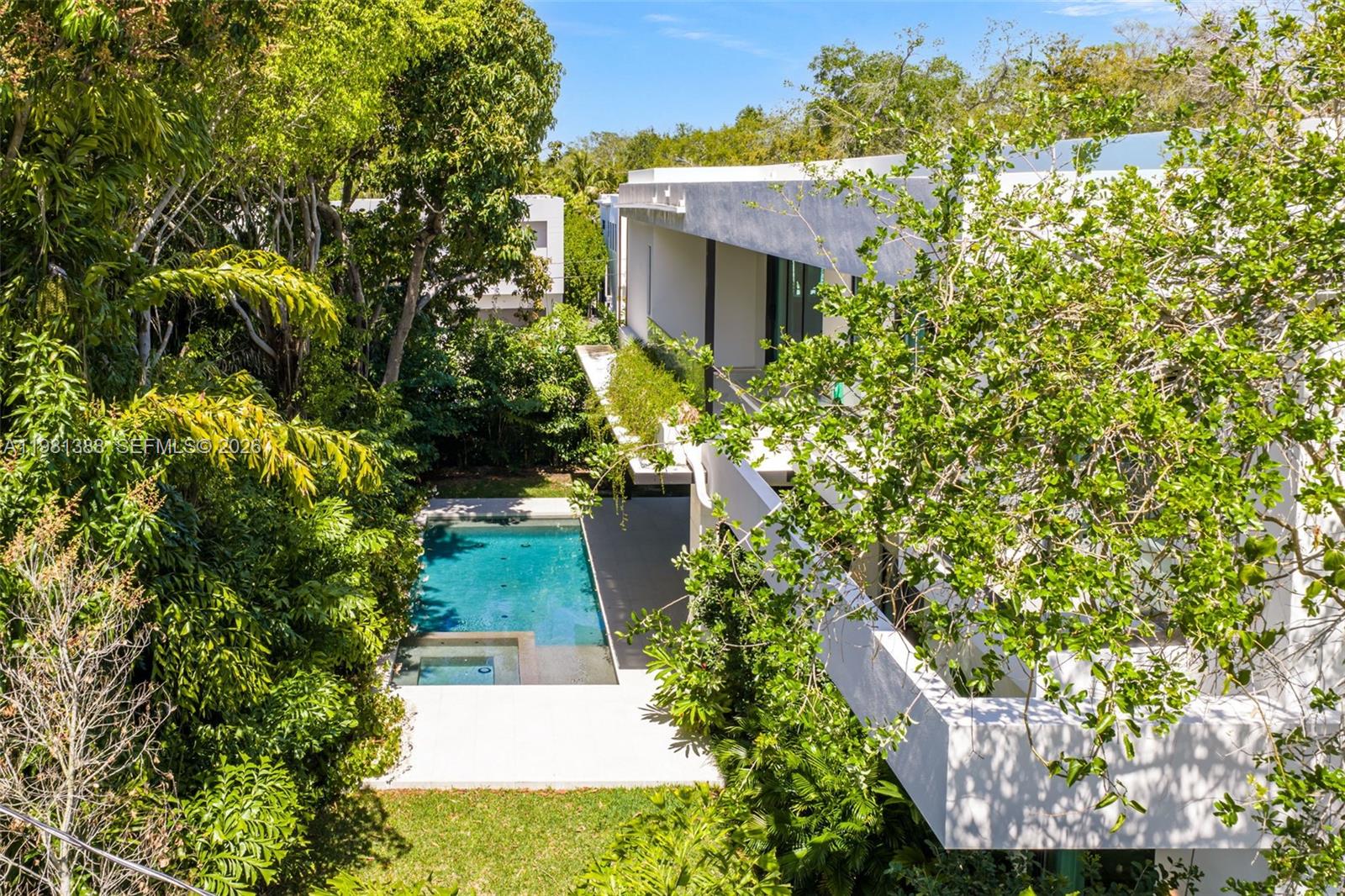 7700 Southwest 50th Court Miami, FL 33143 - Photo 35 of 62 a view of a house with a tree